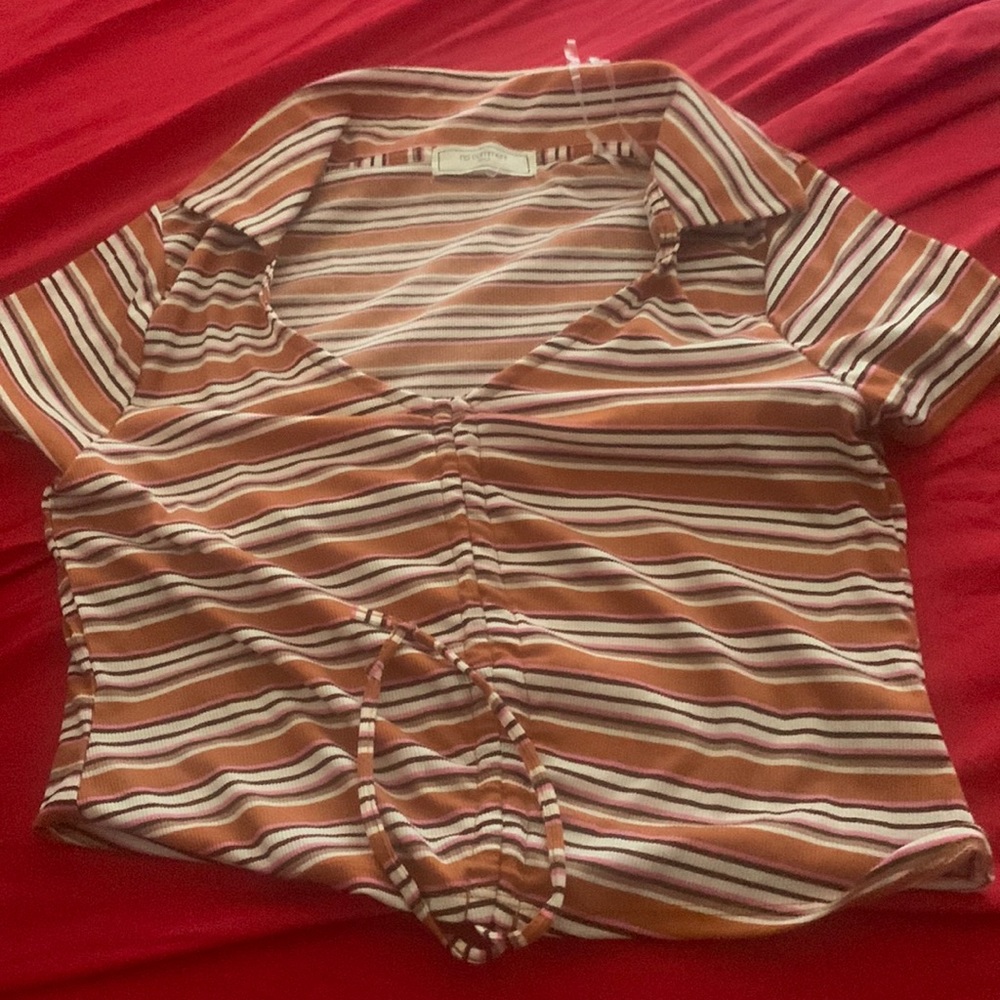 A crop top shirt and it's adjustable